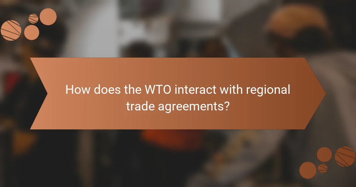 How does the WTO interact with regional trade agreements?